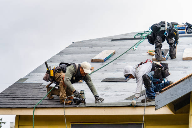 Professional Emergency Roof Repair technician working in Stoneham, MA